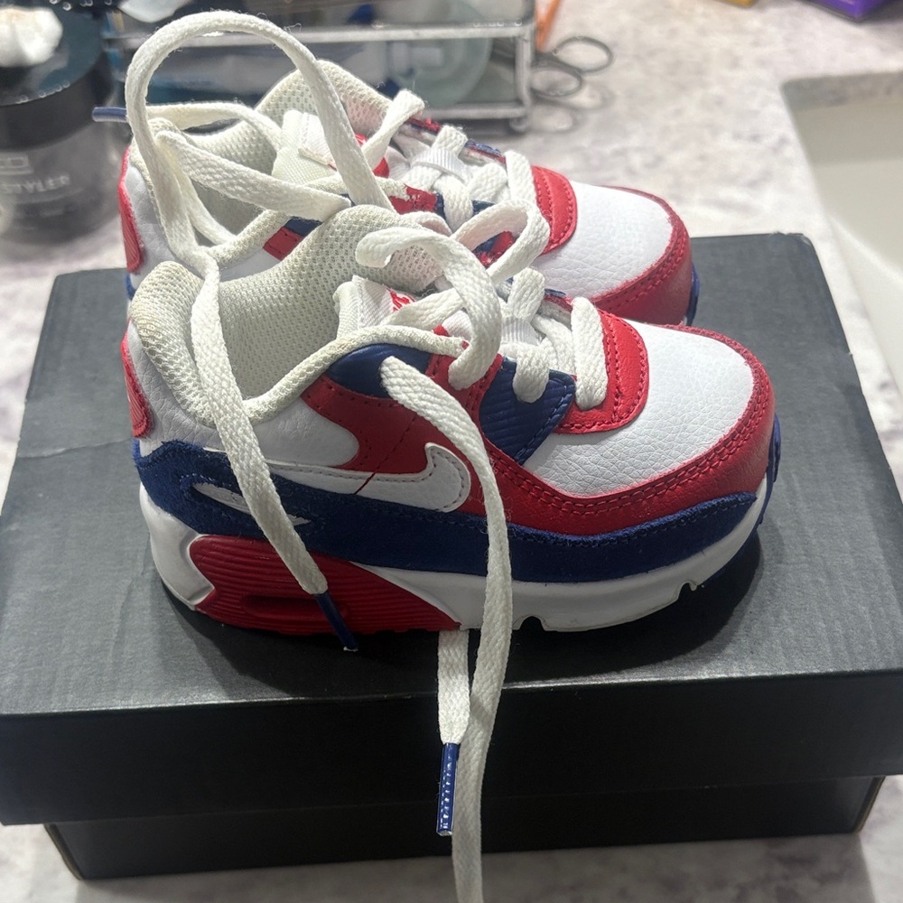 Nike Kids White, Red, and Blue Sneakers